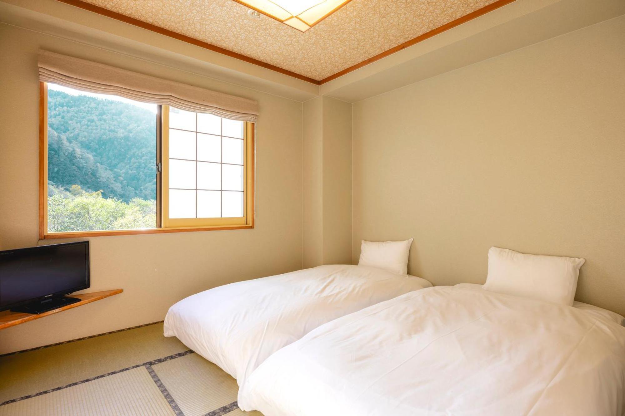 Shikishimaso Hotel Higashikawa Exterior foto
